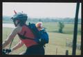 Photograph: [Cyclist with a blue backpack: Lone Star Ride 2002 event photo]