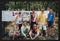 Photograph: [Group of 7 standing by an LSR banner in a park, 2: Lone Star Ride 20…