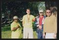 Photograph: [Four people in direct sun by a tree: Lone Star Ride 2003 event photo]