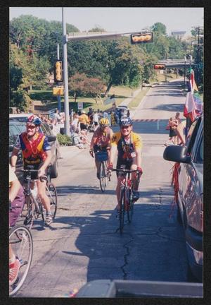 Primary view of object titled '[Cyclists crossing Turtle Creek blvd: Lone Star Ride 2004 event photo]'.