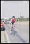 Thumbnail image of item number 1 in: '[Cyclists on the road: Lone Star Ride 2004 event photo]'.