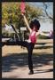 Photograph: [Man posing in a black and pink disco dance costume: Lone Star Ride 2…