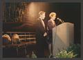 Photograph: [Carl Parker and Cheryl Berman at podium, 2]