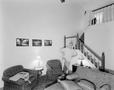 Photograph: [A man posing in his living room]