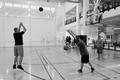Photograph: [Student 1 takes shot during intramural three-point contest]