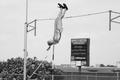 Photograph: [Baylor competitor performs pole vault at Brooks/NT Spring Classic, 2]