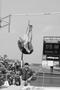 Photograph: [Women's track member performs pole vault at Brooks/NT Spring Classic]