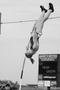 Photograph: [Baylor competitor performs pole vault at Brooks/NT Spring Classic, 1]
