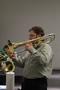 Photograph: [Person playing trombone, College of Music at the Perot Museum]