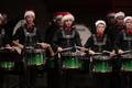Photograph: [Drummers with green drums performing at the Percussion Holiday Perfo…