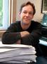 Primary view of [Jake Heggie with sheet music and piano, 2]