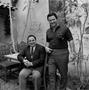 Photograph: [Two men posing at a courtyard #6]