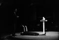 Photograph: [Man and woman on stage during Mike Evans sermon]