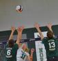 Photograph: [EMU players attempt to block hit by Courtney Windham]