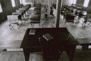 Primary view of object titled '[Teacher's and students desk in Bloomfield]'.