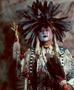 Primary view of [An Indigenous American in traditional black and white powwow clothing, 2]