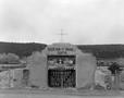 Photograph: [Pueblo cemetery gate arch]