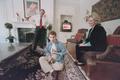 Primary view of [Michael Rowlett and his parents Tracy and Jill in their living room, 2]