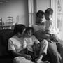 Photograph: [Fred, Diana and their two sons on a couch, 2]