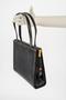 Thumbnail image of item number 2 in: 'Black leather handbag'.