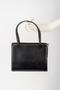 Physical Object: Black leather handbag