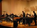 Primary view of [A group of percussionists in black playing xylophones and drums onstage, 4]