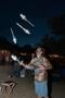 Photograph: [Mesmerizing Skittle Juggling Extravaganza Illuminates the Night at K…