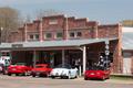 Primary view of [Vintage cars in small town]