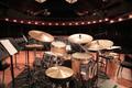 Primary view of [Drumkit on stage at 55th Annual Fall Concert rehearsal, 1]