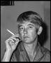 Photograph: [Woman with Short Hair Smoking a Cigarette]