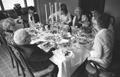 Photograph: [Group of People Having Thanksgiving Dinner]