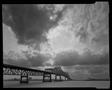 Photograph: [Bridge under a cloudy sky]