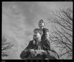 Photograph: [Man with a child on his shoulders]