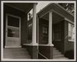 Photograph: [Columns on the front porches of two homes]