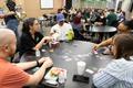 Photograph: [Media library playing a card game]