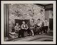 Photograph: [Family of Five Around a Fireplace]