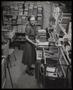 Photograph: [Goodwill Industries - Woman Sorting Books]