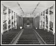 Photograph: [Three rows of pews inside a church, 2]