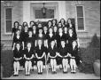 Photograph: [Female Choir Posing in Chilton Hall's Entrance]