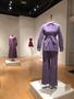Photograph: [Purple spectrum garments on display for an exhibition]