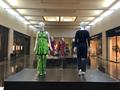 Photograph: [Two outfits on display at mall exhibiton]