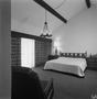 Photograph: [A bedroom with a chandelier, 1]