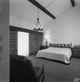 Photograph: [A bedroom with a chandelier, 3]