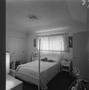 Primary view of [A bedroom with pale furniture, 2]