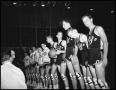 Photograph: [Basketball team at opening ceremony]