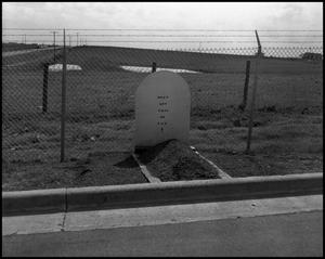 Primary view of object titled '[Gravestone at Nike Missile Site]'.