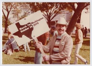 Primary view of object titled '[Don Baker holding a sign at the 1979 March on Washington]'.