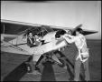 Thumbnail image of item number 1 in: '[Students with Plane]'.
