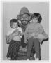 Thumbnail image of item number 1 in: '[Ken Curtis with two children]'.