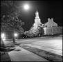 Photograph: [Administration Building from the northwest at night]